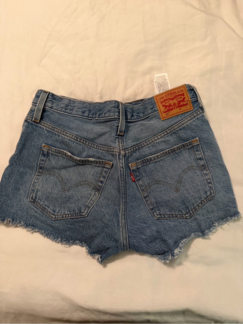 Levi's 501 Light Blue Denim Cutoff Shorts with Frayed Hem